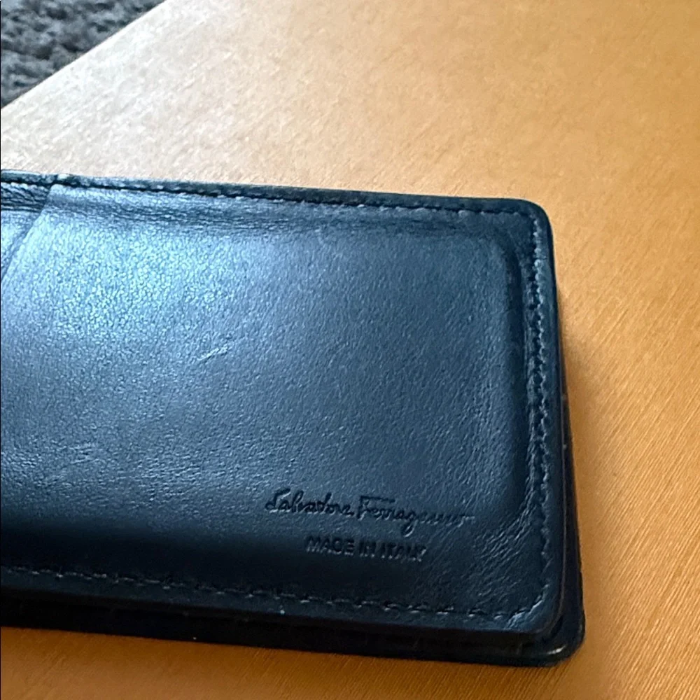 Salvatore Ferragamo Made In Italy Mini Gancino Textured Leather Card Case.